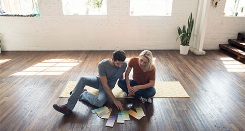 Couple looking at color swatches
