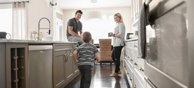 Family with children in their kitchen