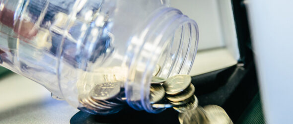 Coin Jar Emptied Into Counter