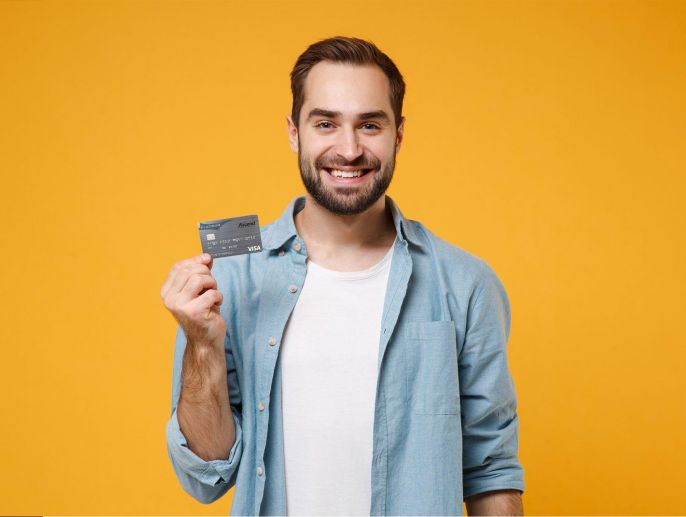 Man holding a credit card