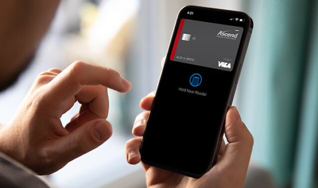 A man adds his Ascend card to his digital wallet via phone.