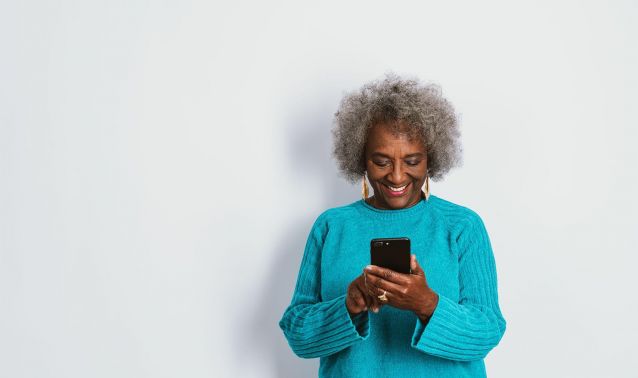 A woman looking at her phone.