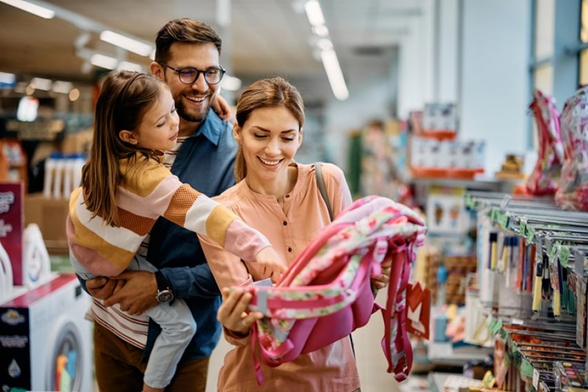 A family shops for back to school clothes