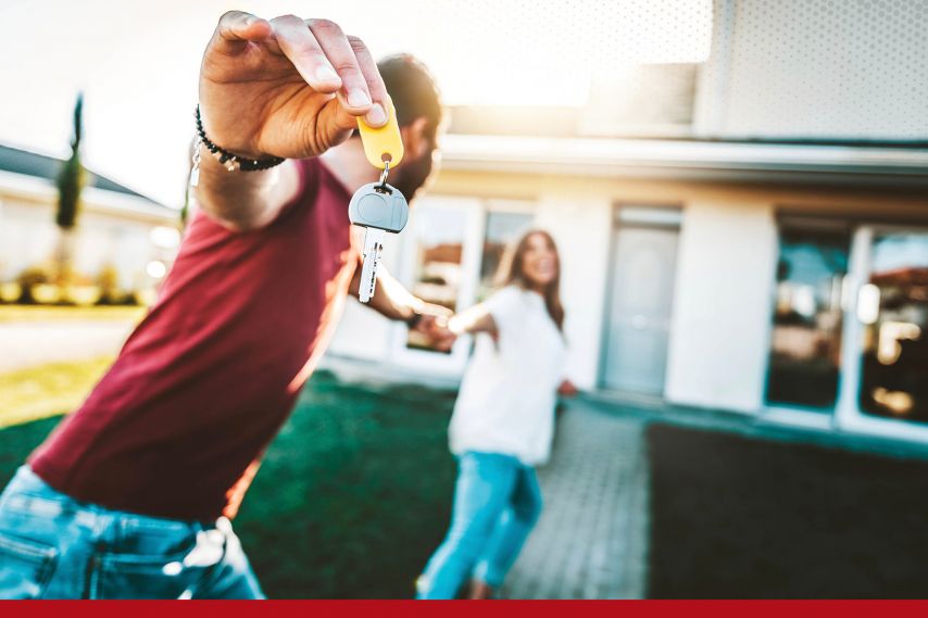 two new homeowners enter their home for the first time