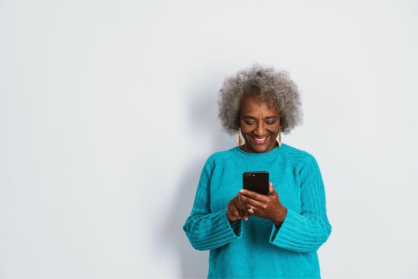 A woman looking at her phone.