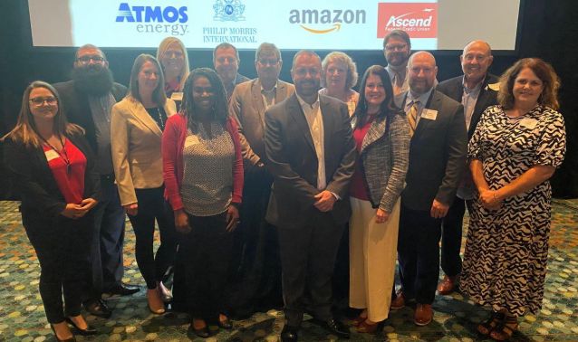 Ascend employees pose for a photo at 2024 Heroes Breakfast