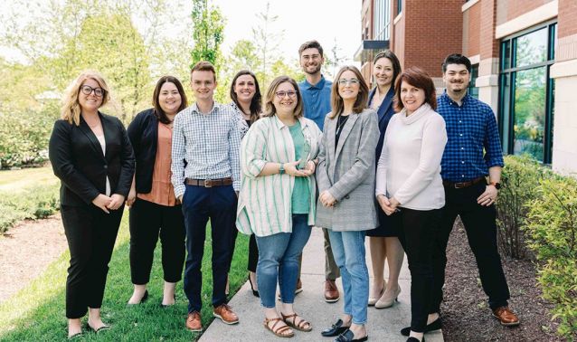 Ascend marketing team poses with CUNA diamond award