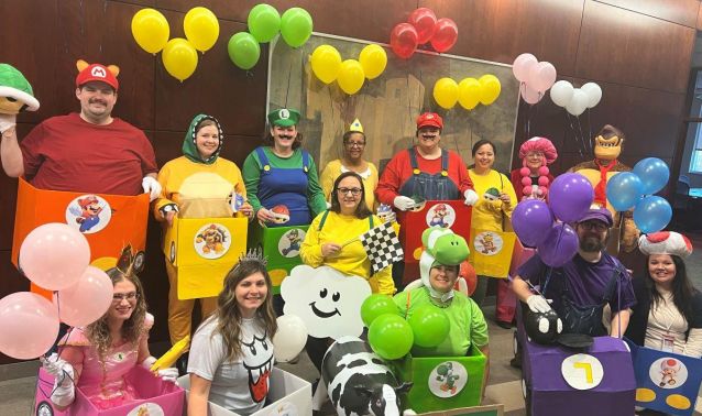 Ascend team members dressed in Mario themed costumes