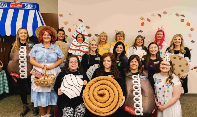 Ascend employees pose in halloween costume