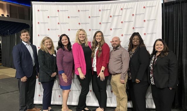 Ascend leadership poses at lifesaver luncheon