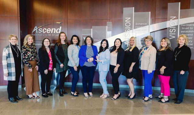 Ascend HR poses with Apex training award