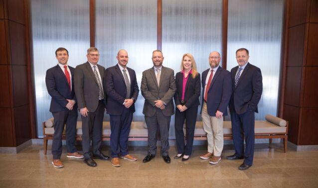 Ascend executive leadership team poses for photo