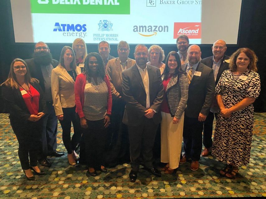 Ascend employees pose for a photo at 2024 Heroes Breakfast