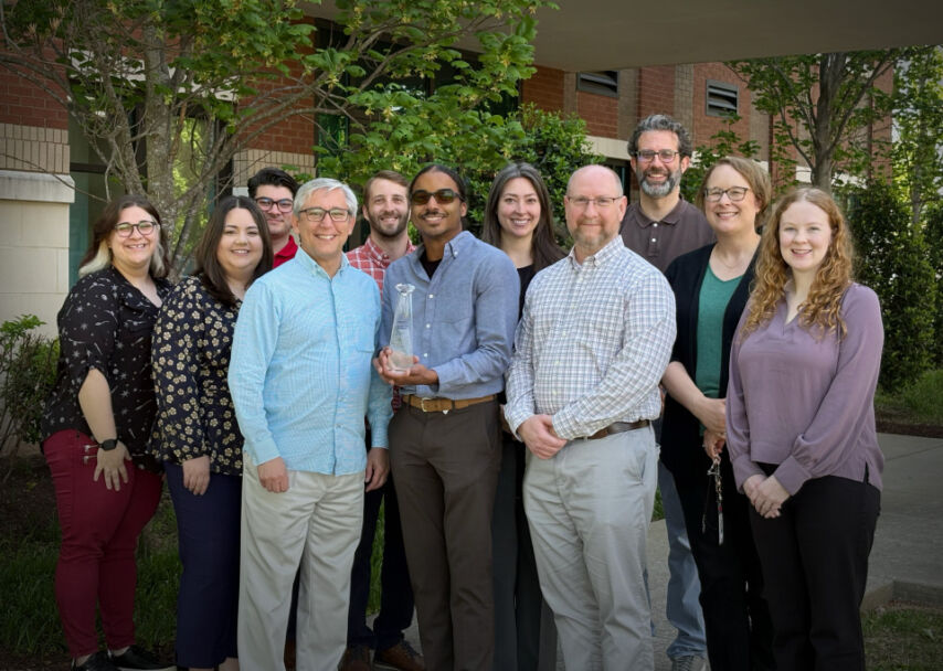 Ascend Marketing Team poses with Diamond Award