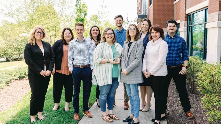 Ascend marketing team poses with CUNA diamond award