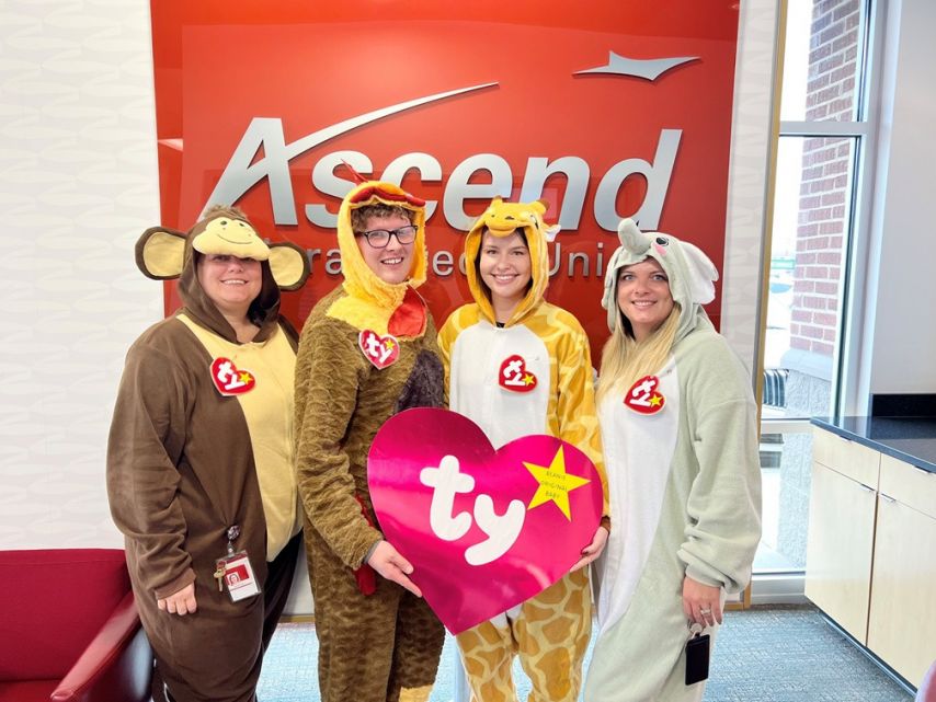 Ascend branch employees pose in their halloween costumes