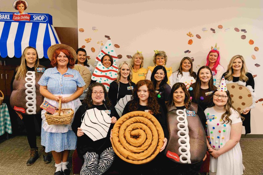 Ascend employees pose in halloween costume