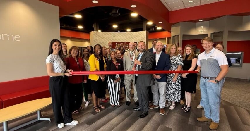 Ascend team poses for photo at ribbon cutting ceremony for new Clarksville branch.