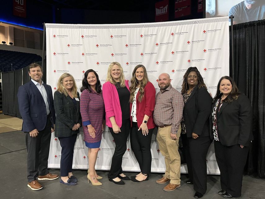 Ascend leadership poses at lifesaver luncheon