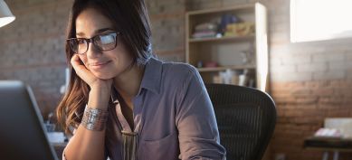 Young professional using her laptop