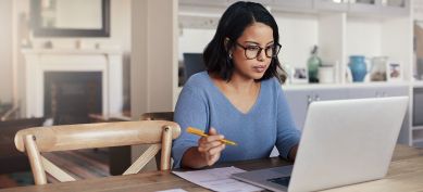 Young professional using her laptop