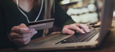 Lady using her laptop and credit card