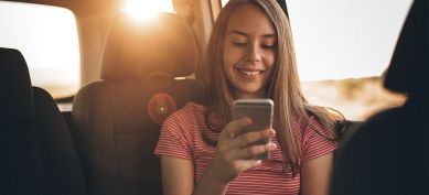 Young girl using her phone