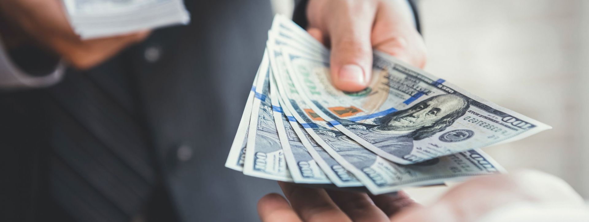 Teller handing over money