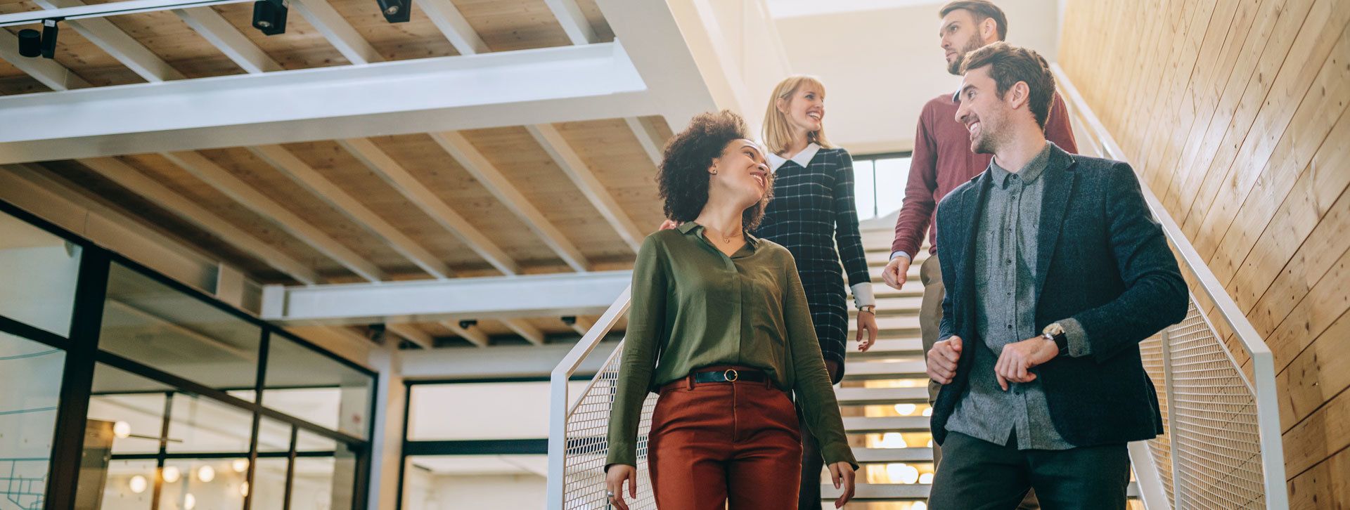 Employees walking down stairs