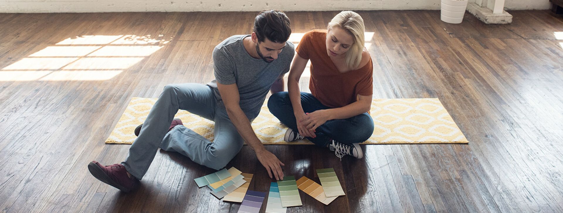 Couple looking at color swatches