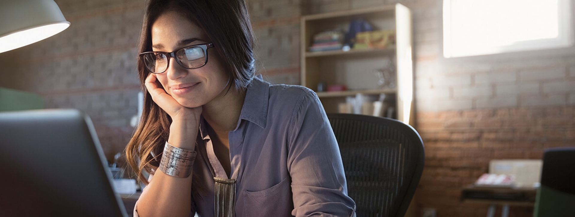 Young professional using her laptop