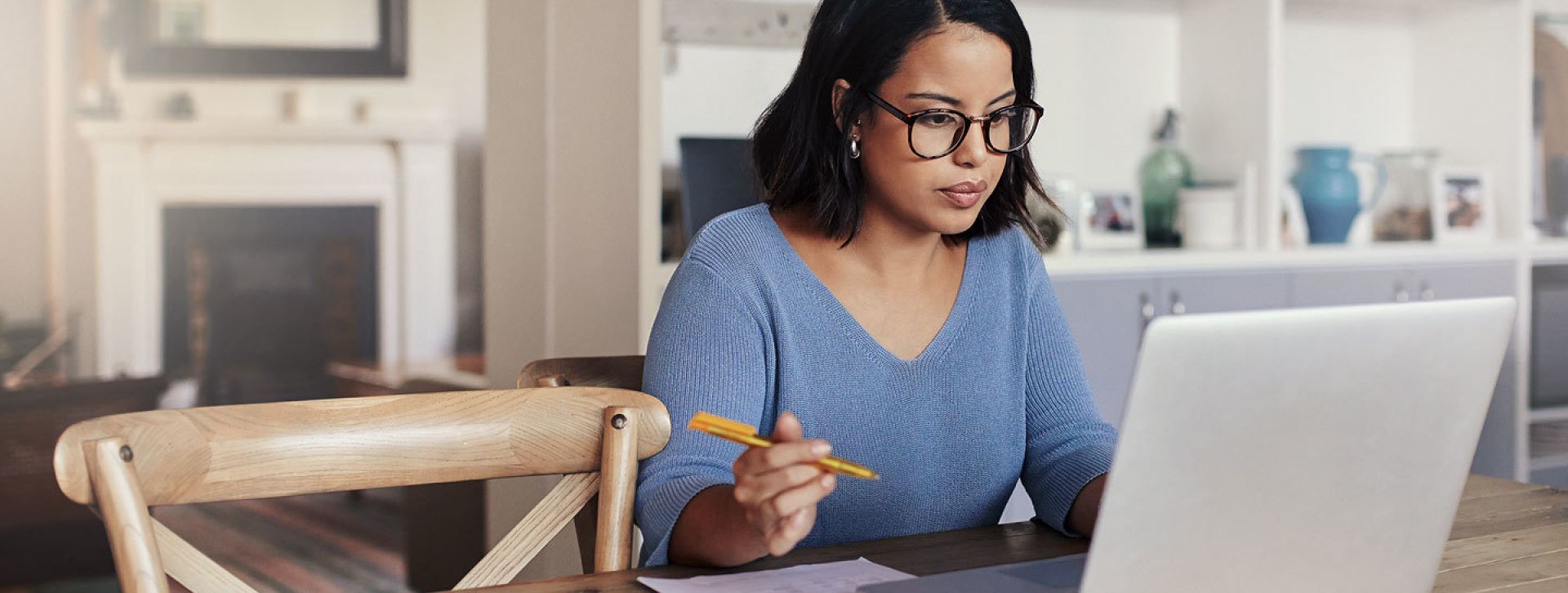 Young professional using her laptop