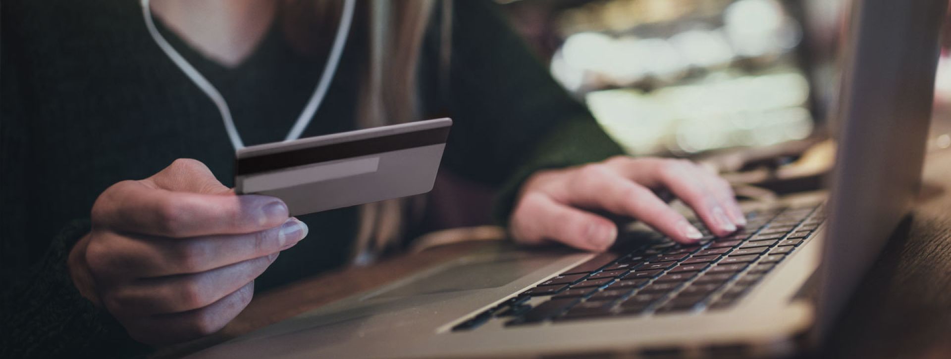 Lady using her laptop and credit card